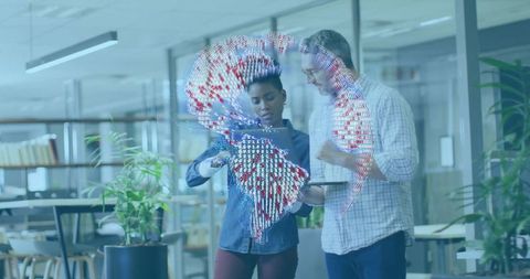 Team analyzing holographic globe in modern office environment