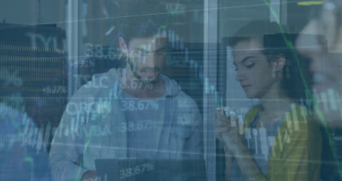 Team Analyzing Stock Market Trends on Laptop in Modern Office