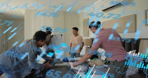 Friends packing luggage together on hotel bed with digital data overlay for trip planning