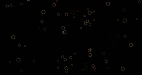 Colorful confetti circles floating on black background