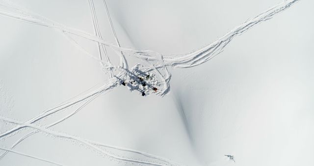 Snowmobiles on Pristine Snowy Landscape Captured from Above - Download Free Stock Images Pikwizard.com