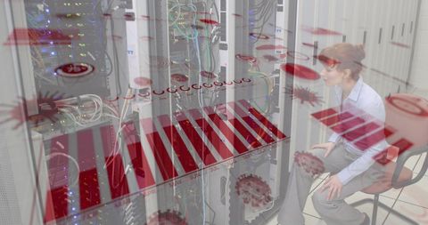 Female it specialist analyzing server data visualizations