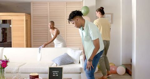 Thoughtful Man in Casual Home Celebration Scene