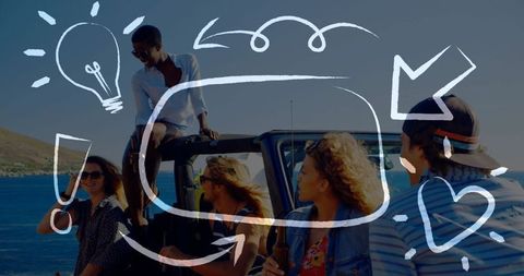 Group of Friends Relaxing by Beachside during Summer Road Trip