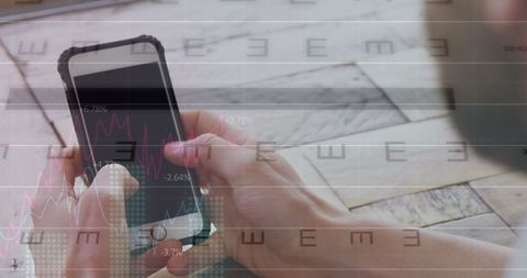 Analyzing Stock Market Data on Smartphone at Workstation - Download Free Stock Images Pikwizard.com