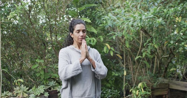 Woman Practicing Meditation in Tranquil Garden Setting - Download Free Stock Images Pikwizard.com