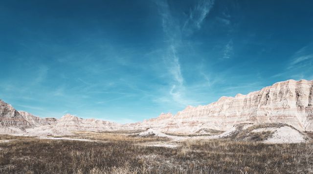 Perfect for use in travel blogs, nature documentaries, geological studies, and tourism ads showcasing the raw beauty of Badlands National Park in South Dakota. Ideal for backgrounds and educational materials about natural landscapes and erosion.