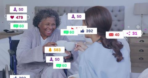 Senior woman and caregiver laughing, sharing tea with floating social media notifications