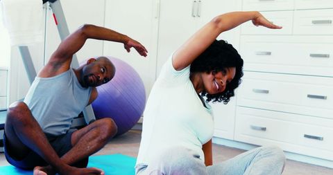 African American Couple Practicing Home Stretching Exercises - Download Free Stock Images Pikwizard.com