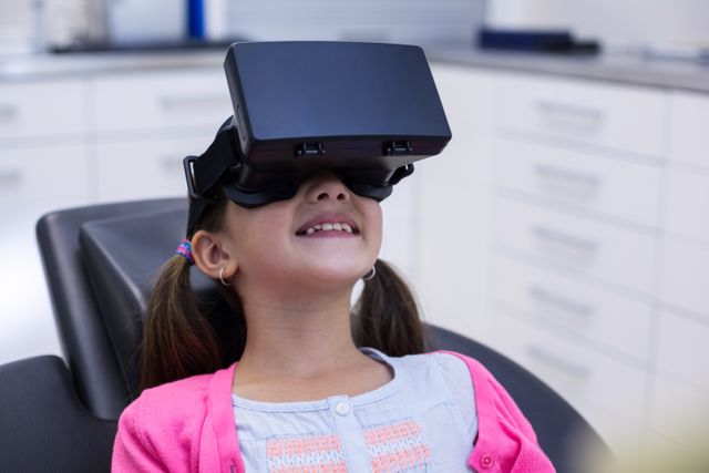 Girl using virtual reality headset during a dental visit in clinic