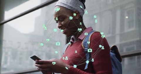 Woman Using Smartphone with Digital Network Overlay in Urban Setting