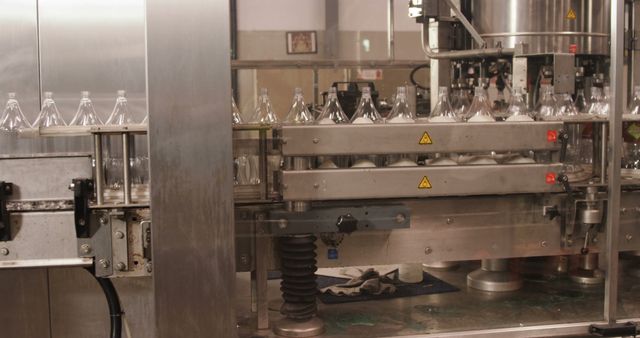 Industrial Bottling Line with Plastic Bottles in Production - Download Free Stock Images Pikwizard.com