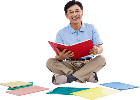 transparent smiling man reading with colorful binders on ground - Download Free Stock Videos Pikwizard.com