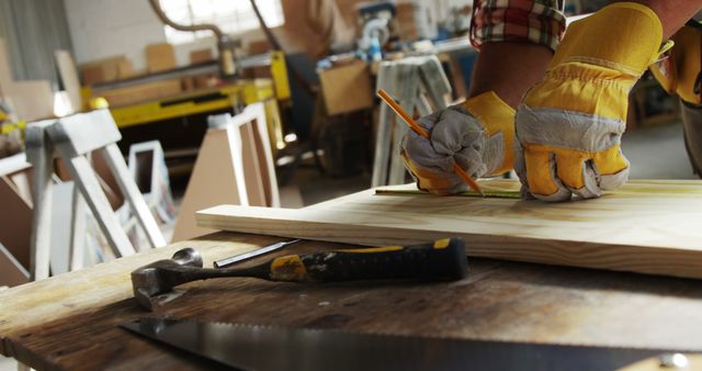 Carpenter Measuring Wood Piece in Workshop - Download Free Stock Images Pikwizard.com