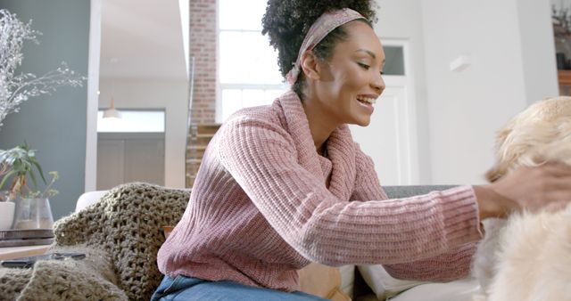 Woman Bonding with Dog in Cozy Living Room on Sunny Day - Download Free Stock Images Pikwizard.com