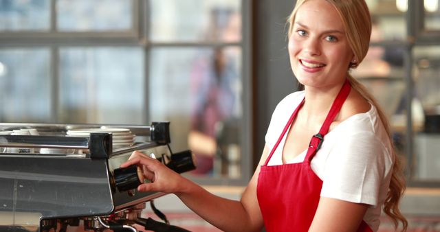 Smiling Barista Operating Espresso Machine in Coffee Shop - Download Free Stock Images Pikwizard.com