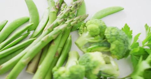 Fresh Green Vegetables Arrangement Featuring Asparagus and Broccoli