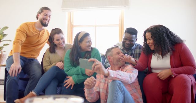 Diverse Group of Friends Relaxing and Taking Selfies on Sofa - Download Free Stock Images Pikwizard.com