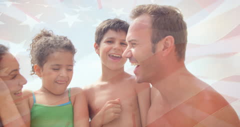 Diverse Family Celebrating at Beach with USA Flag Overlay
