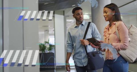 Business Colleagues Analyzing Data with Digital Overlays