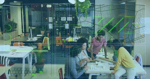 Design team reviewing scale model with augmented reality overlays in coworking hub