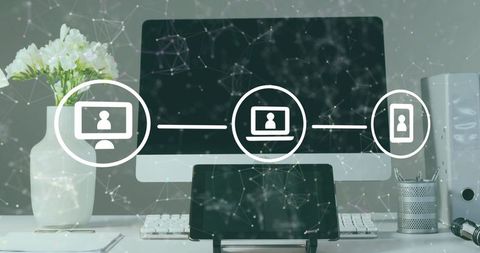 Workspace technology concept displaying connected devices and user icons over clean desk