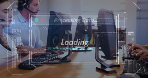 Call Center Team Typing and Collaborating at Open-Plan Workstations with Data Loading HUD