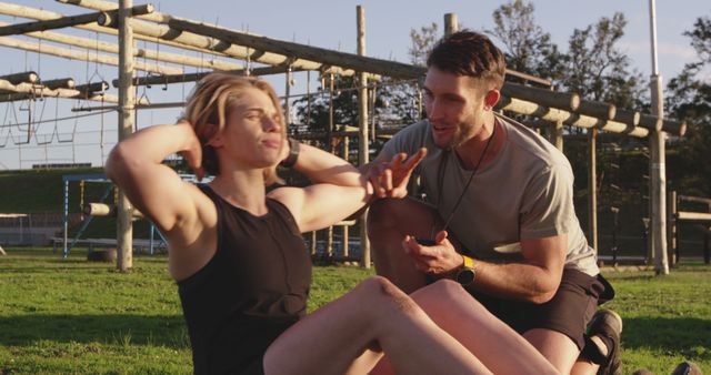 Fitness Trainer Coaching Woman During Outdoor Workout at Obstacle Course - Download Free Stock Images Pikwizard.com