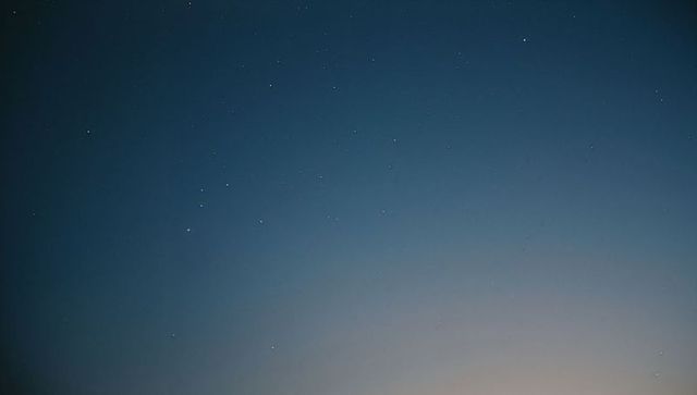 Tranquil evening sky with stars at dusk