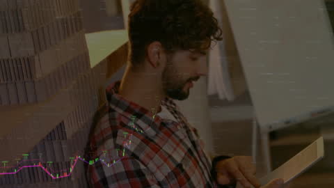 Caucasian Man Analyzing Financial Data on Tablet