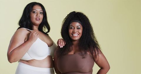 Diverse Female Models Embracing Confidence in Lingerie Studio Session