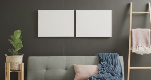 Minimalist Living Room with Sofa and Blank Canvases