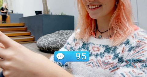 Cheerful Woman Relaxing with Smartphone on Patio, Chat Message Icon Overlay