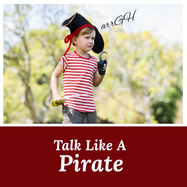 Digital image of cute caucasian boy playing pirate in park with talk like a pirate text, copy space - Download Free Stock Videos Pikwizard.com