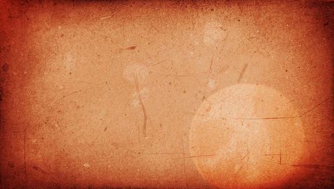 Warm grunge orange background with radiant orb, vintage paper texture, scratched patina