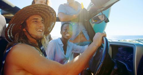 Friends Driving Convertible on Scenic Coastal Road Trip - Download Free Stock Images Pikwizard.com