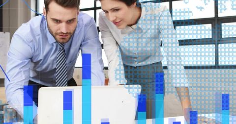 Diverse Team Collaborating on Global Data Analysis in Office