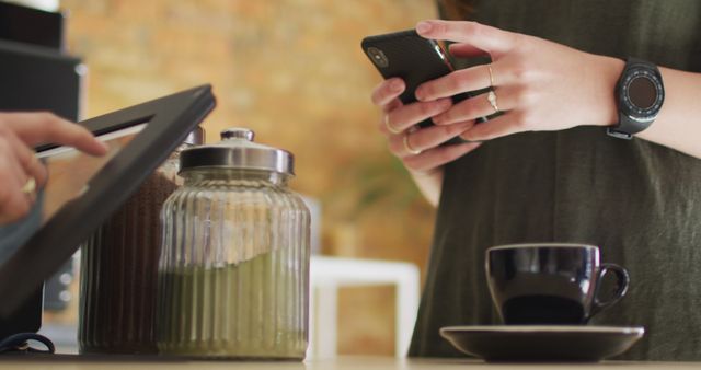 Close-up of Person Using Smartphone in Coffee Shop - Download Free Stock Images Pikwizard.com