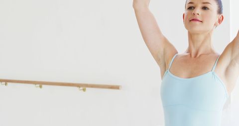 Middle-Aged Woman Practicing Ballet Gracefully - Download Free Stock Images Pikwizard.com