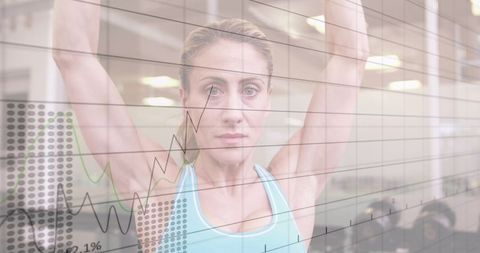 Combining Fitness and Data Technology with Woman Lifting Weights