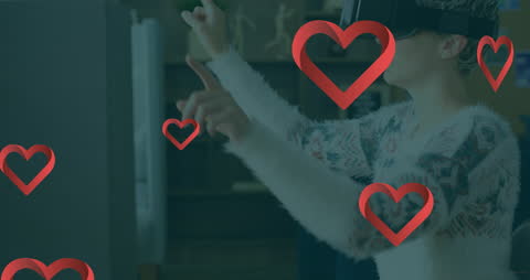 Person Engaging with Virtual Reality Heart Symbols