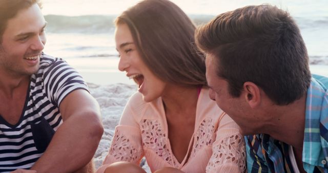 Young Friends Laughing and Enjoying Time at the Beach - Download Free Stock Images Pikwizard.com