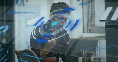 Asian Man Engaging with Futuristic Holographic Technology