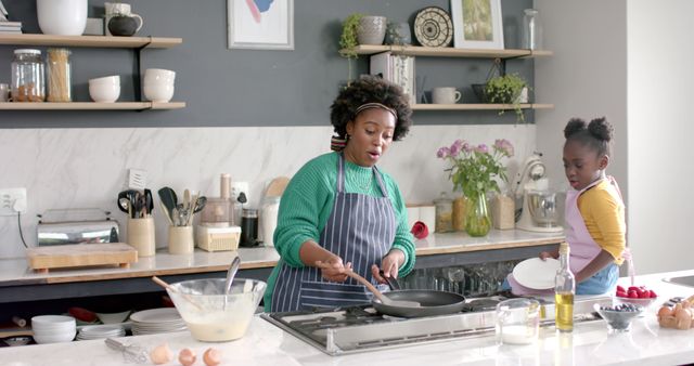 Mother and Daughter Cooking in Modern Kitchen - Download Free Stock Images Pikwizard.com