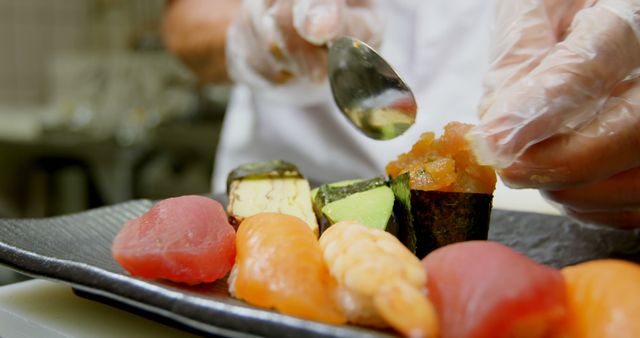 Chef Preparing Delicious Sushi Platter with Fresh Ingredients - Download Free Stock Images Pikwizard.com