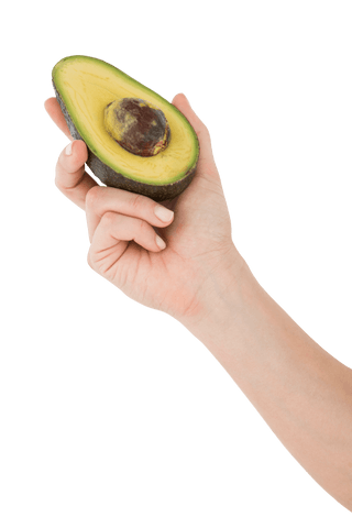 hand holding half avocado against transparent background - Download Free Stock Videos Pikwizard.com