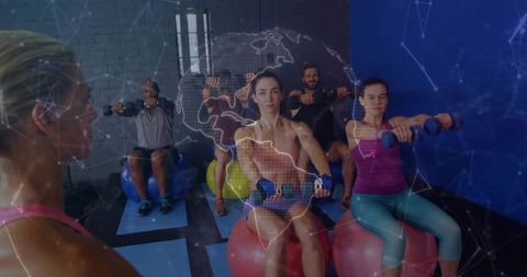 Group training on stability balls performing seated front raises with trainer and virtual overlay