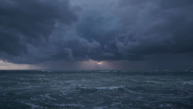 Dramatic Stormy Seas at Sunset with Turbulent Waves