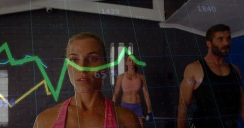 Focused Athlete Tracking Performance with Digital Data Overlay During Group Strength Training Sessio