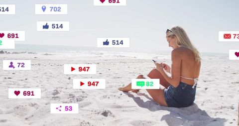 Social Media Savvy Influencer Enjoys Relaxing Day at Beach